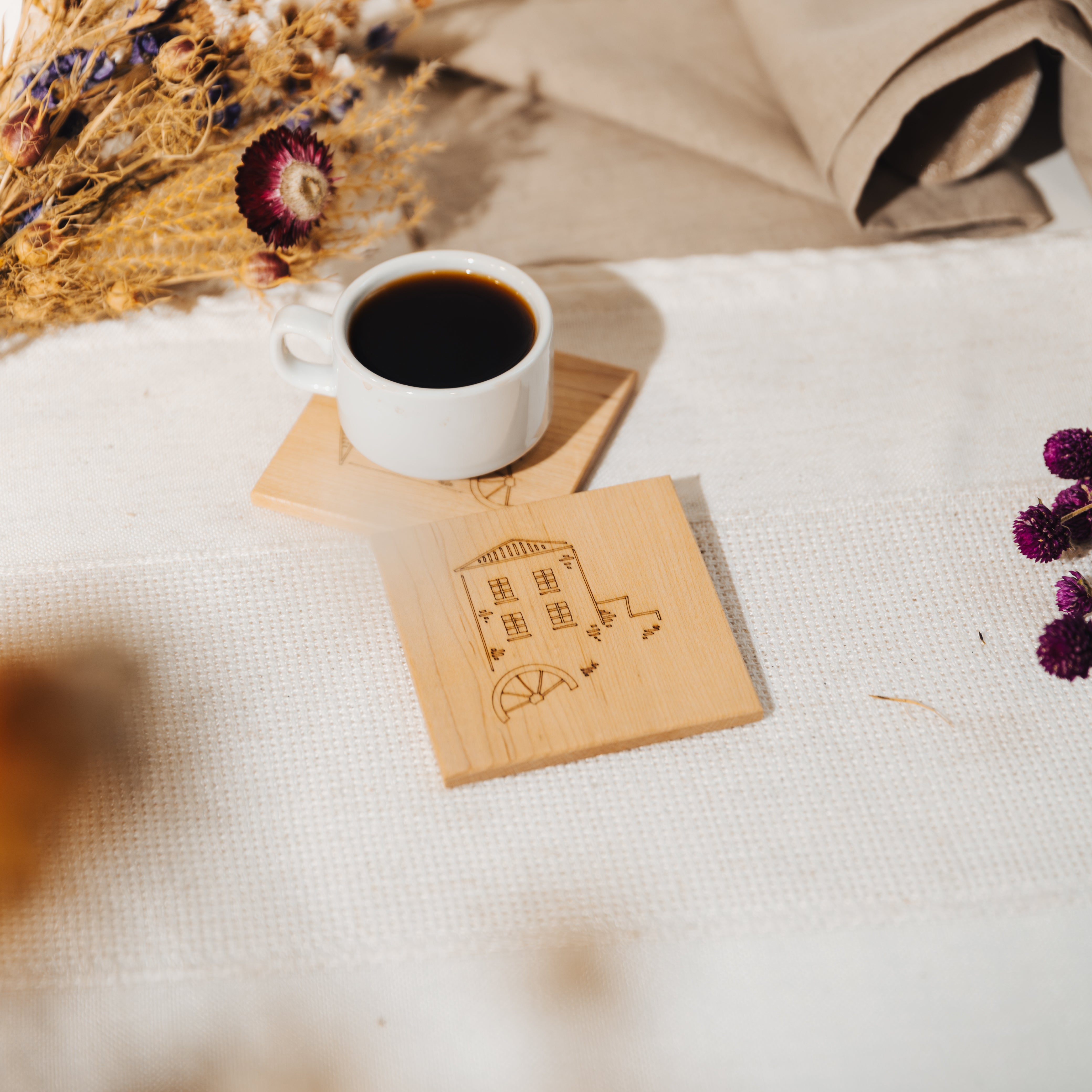 sous verre en bois derable avec logo de la vallee